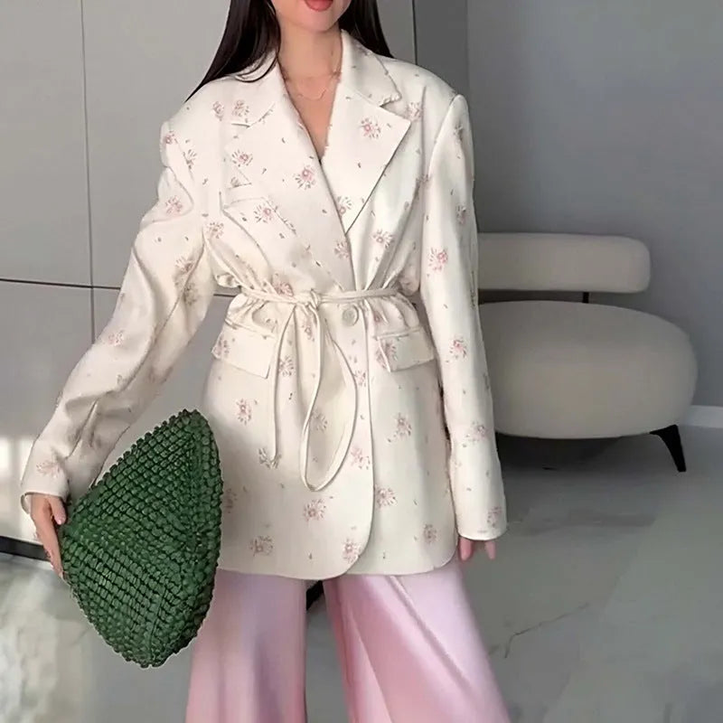 Womens lace-up collar suit jacket in a floral print with a cinched waist