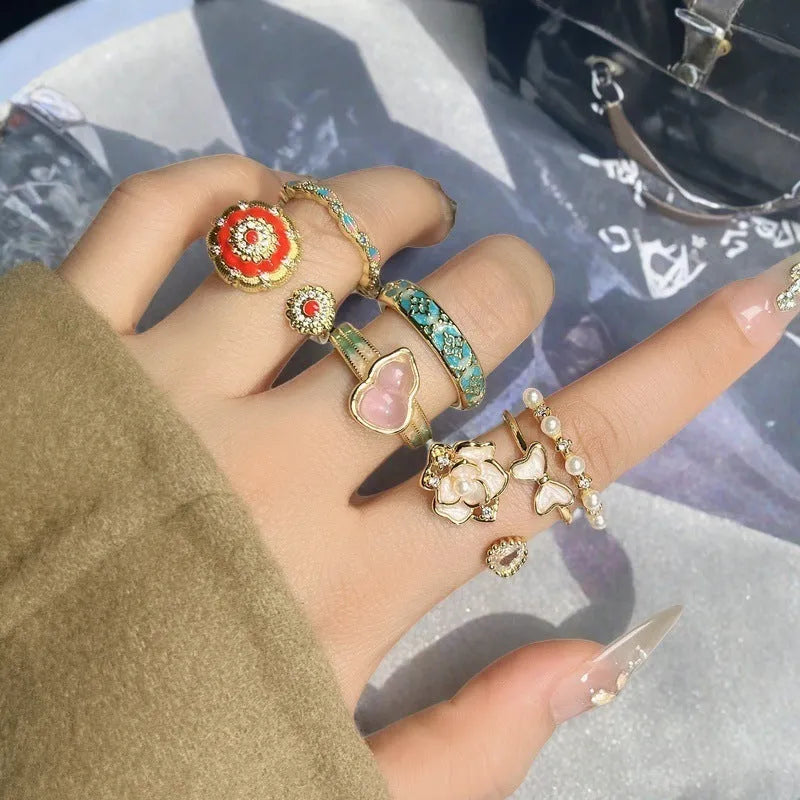 Adjustable gourd vintage ring with oil dripping finish in New Chinese style showing bow-shaped elements and zircon details