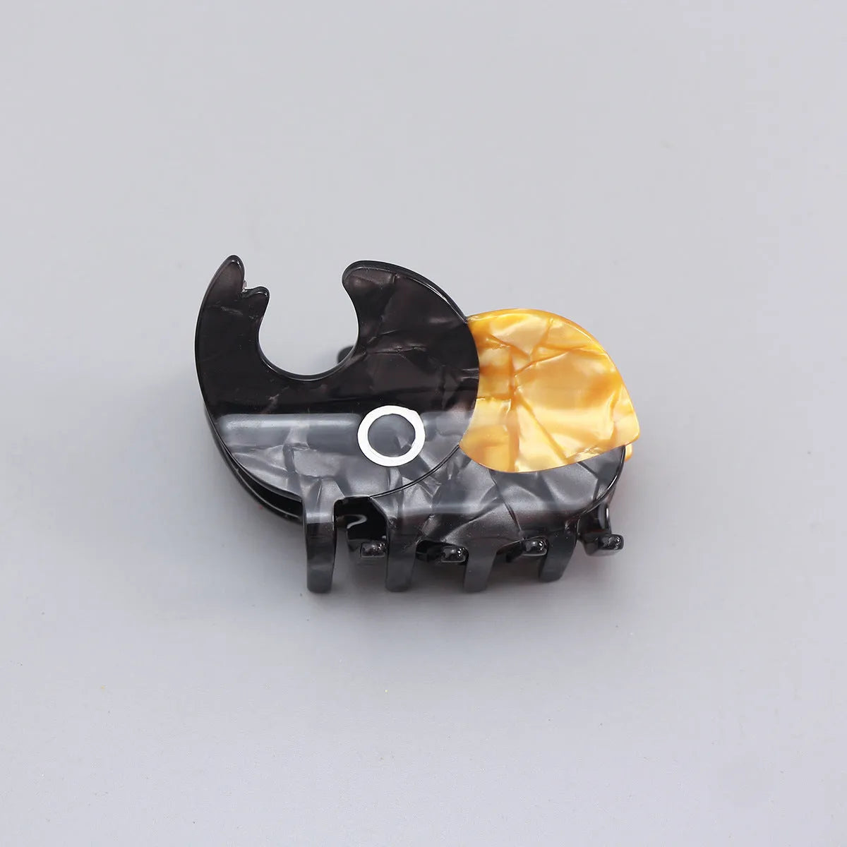 Handmade cellulose acetate insect beetle grip desk accessory with cartoon caterpillar design
