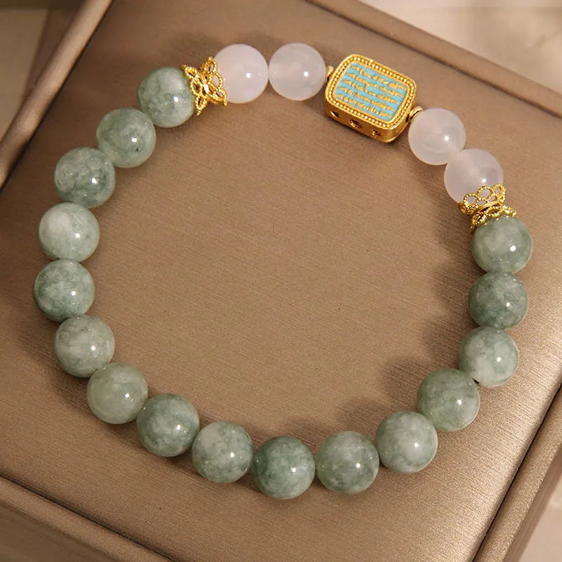 Women's oil green emerald crystal bracelet with five scripture bead design on wrist