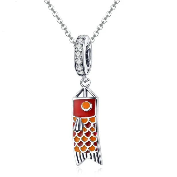 S925 sterling silver carp streamer jewellery charm with zircon stones and oil drop oxidation finish.