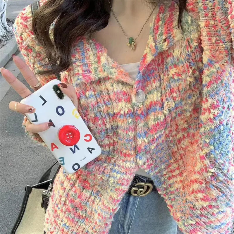 Retro slim fit pink knitted cardigan with regular sleeves on a hanger
