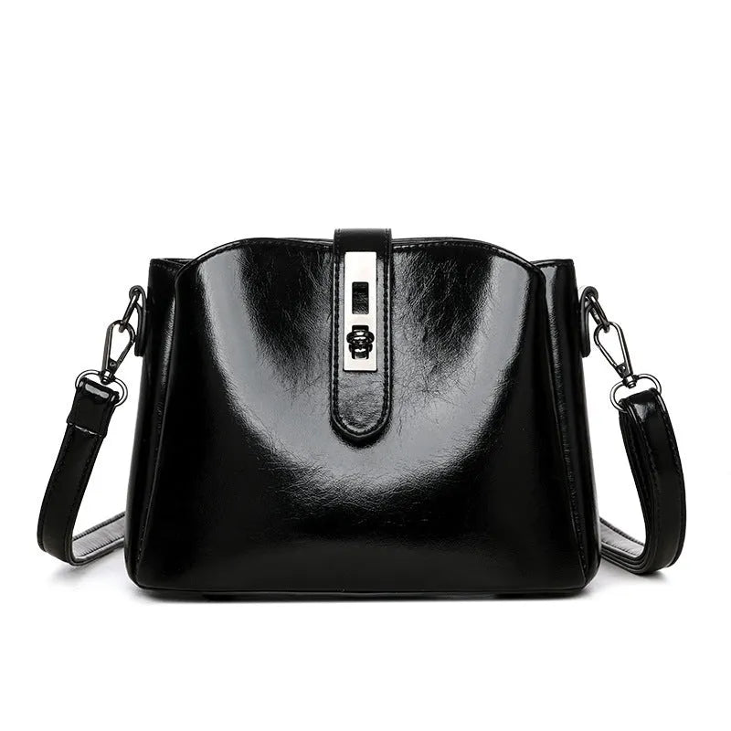 Retro women's messenger bag in PU material with medium hardness and sandwich pocket, available in white black brown