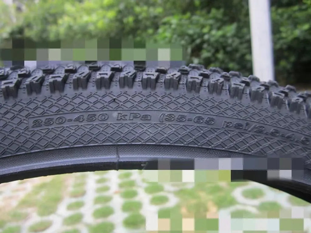Ultralight puncture-resistant mountain bike tyre showing tread pattern and available sizes