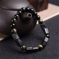 Natural obsidian single bead bracelet with 8mm diameter stone and retro constellation detailing on metal components