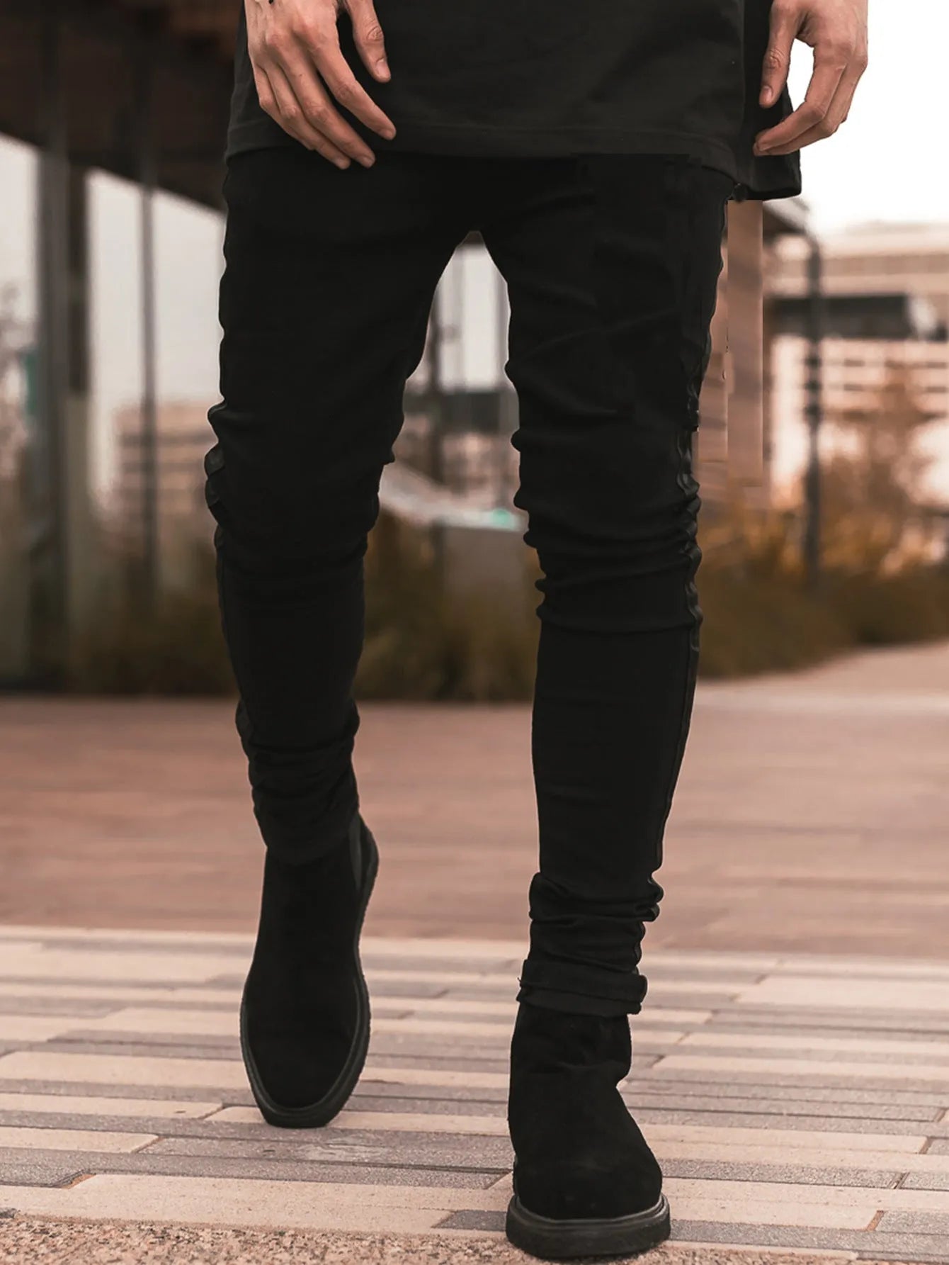 Men's ripped black slim-fit high waist cotton denim trousers with elastic waist