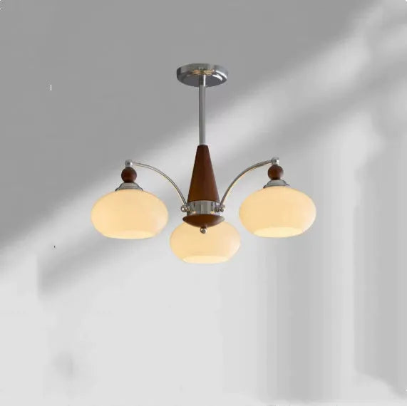 Creative persimmon glass chandelier with chrome frame and multiple glass shades in milky white or cream yellow.