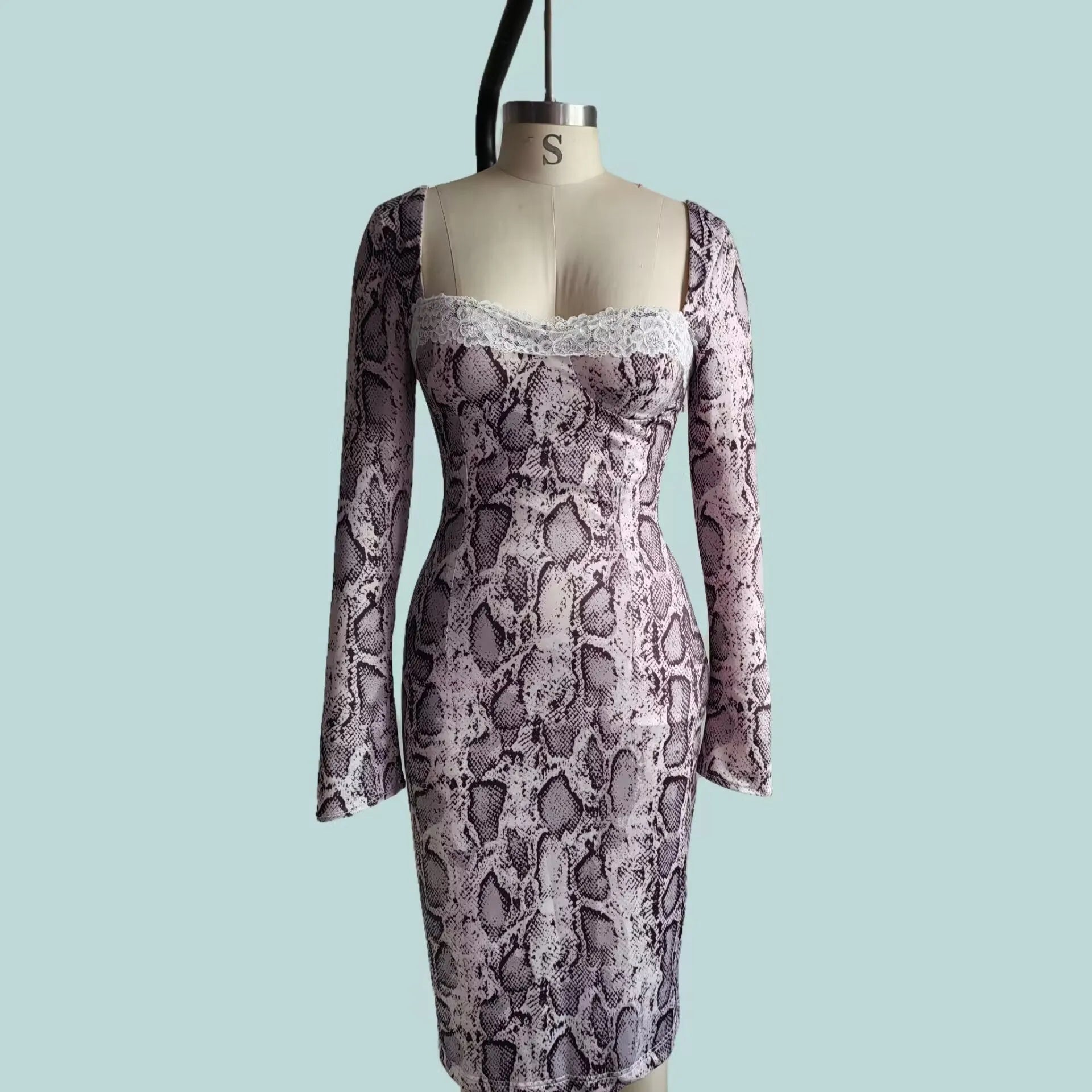 Grey slim fit lace dress with long sleeves, A-line skirt, and a 3D digital printed pattern.