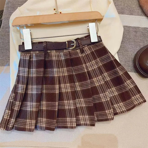 Girls plaid pleated A-line skirt in cotton blend fabric shown in casual setting