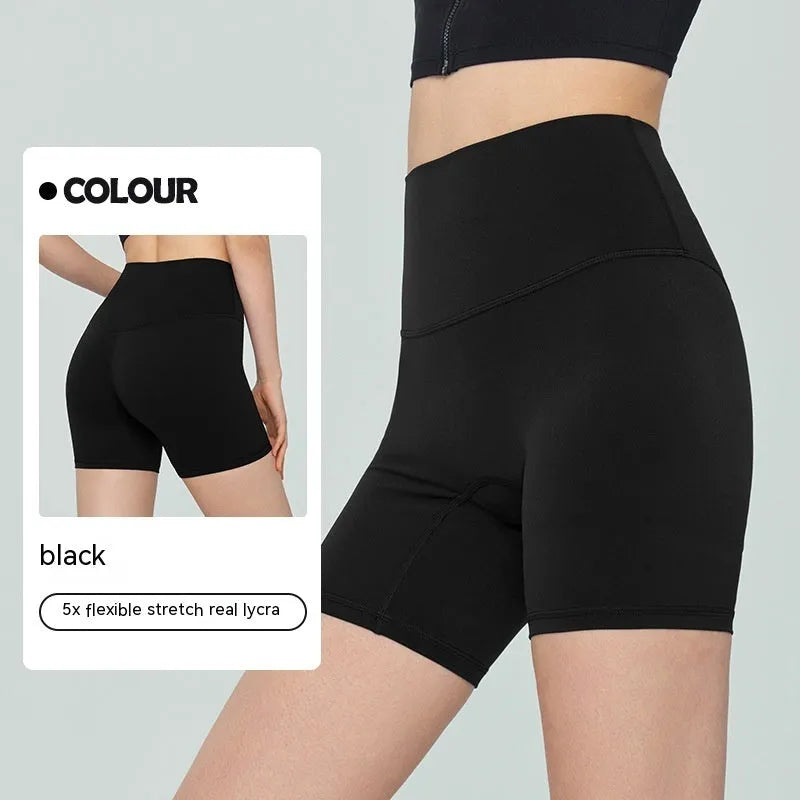 Women's lycra yoga tight shorts in leaf green colour showing high waist and short length design