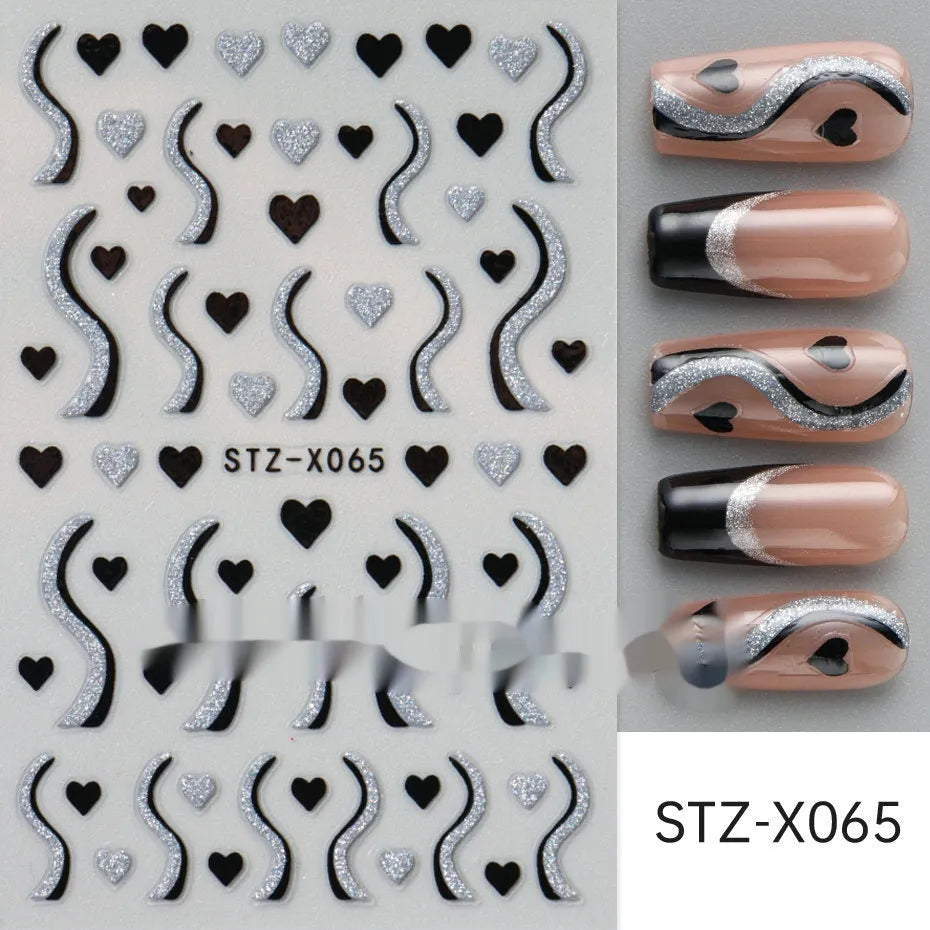 Sheet of black and silver strip nail art stickers with cartoon and love heart designs