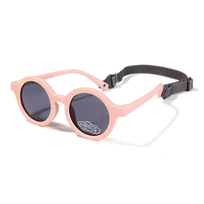 Children's round sunglasses for 0-3 year olds with UV400 protection, shown in a selection of colours.