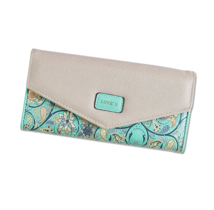 Women's three-fold leather wallet with buckle closure in black, blue, green, melon red or violet