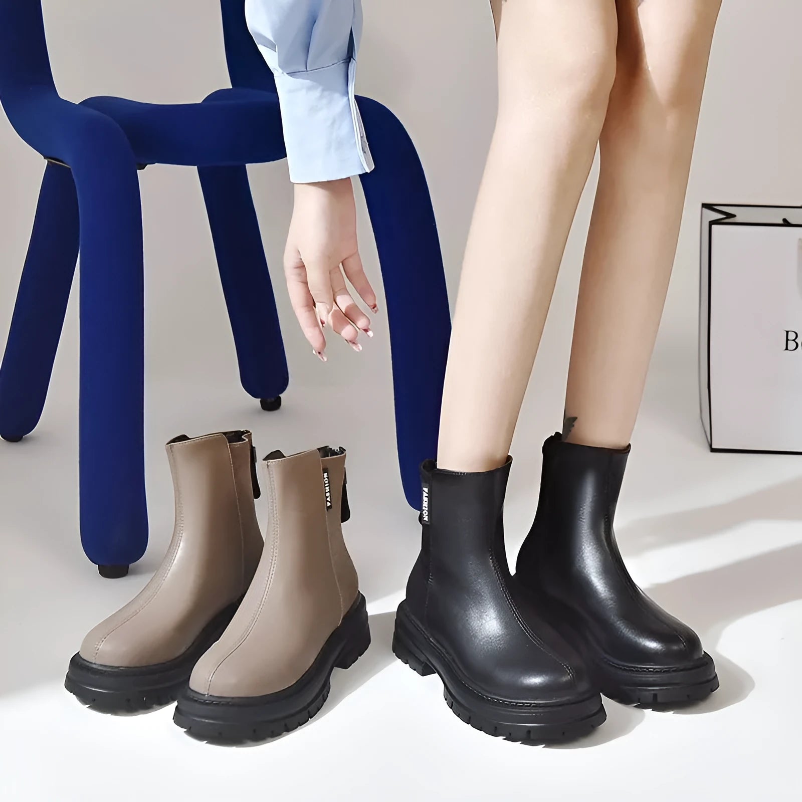 Women's British style platform Martin boots in solid black with rubber sole, low tube design, sizes 35-43