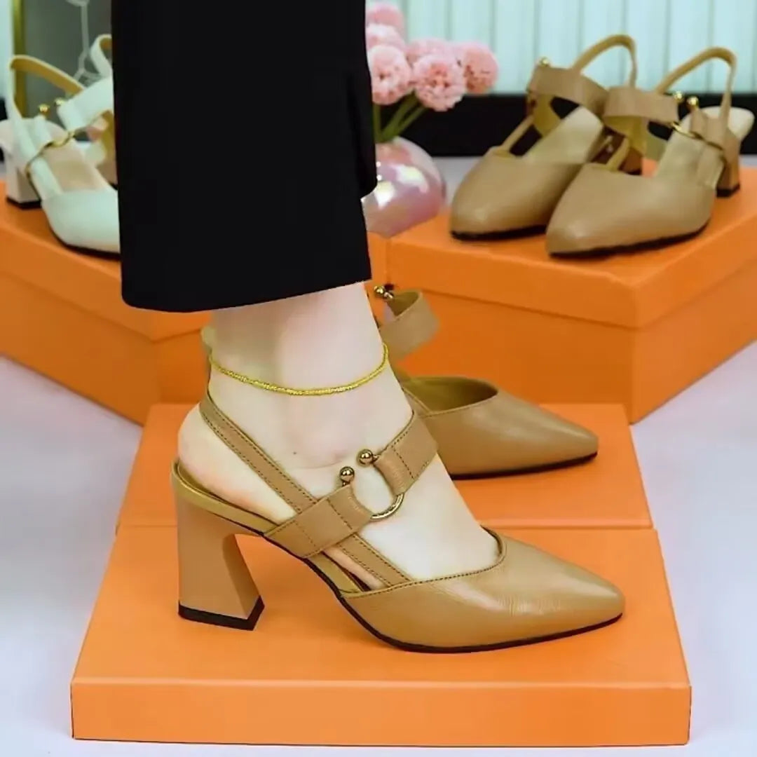 Women's apricot coloured leather sandals with a closed toe, chunky high heel, and rubber sole.