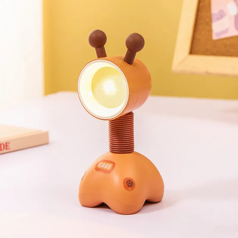 Cartoon animal magnetic night lamp with adjustable head on metallic surface