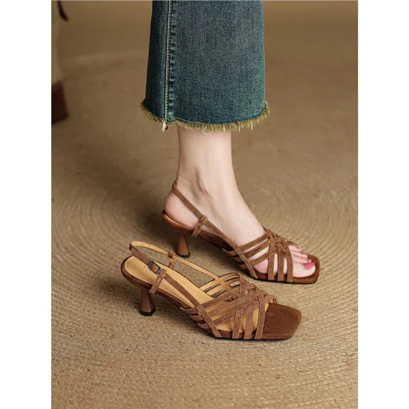 Retro women's high heel sandals with thin cross straps, square toe, and ankle buckle in light brown.