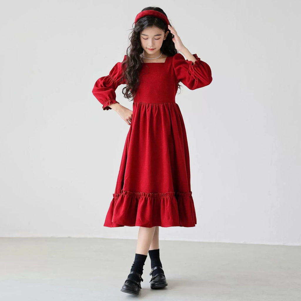 Girl's long sleeve solid red square neck dress with flounce skirt on a child