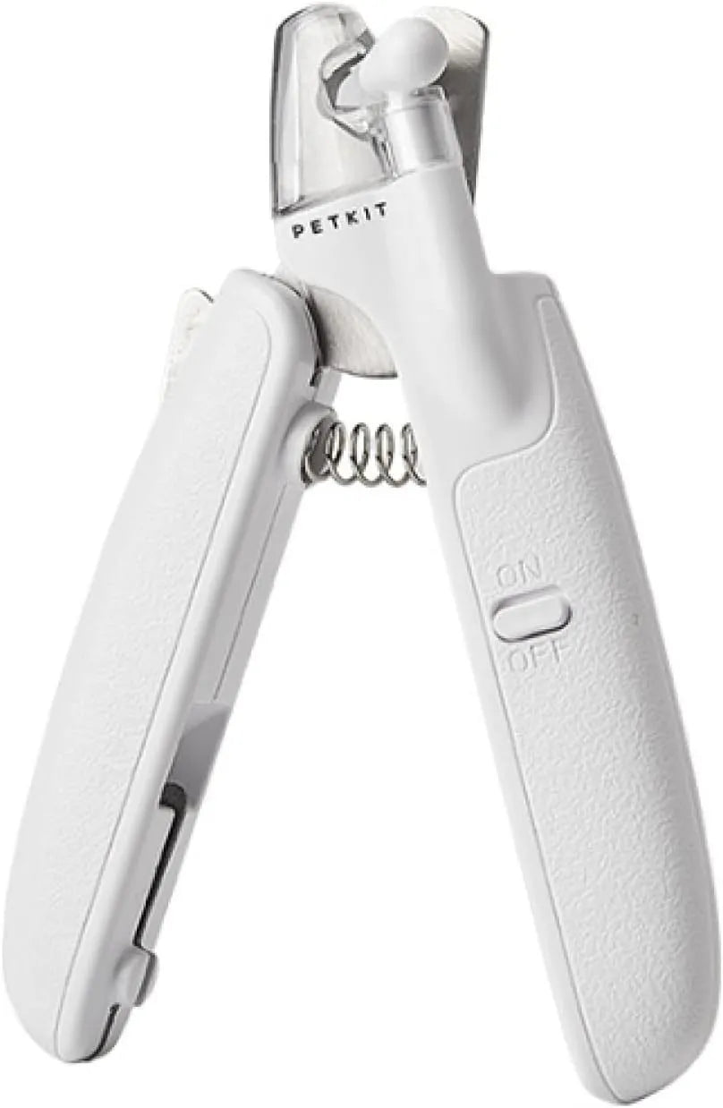 White pet nail clippers with LED light and a transparent anti-splash guard, shown with a nail file.