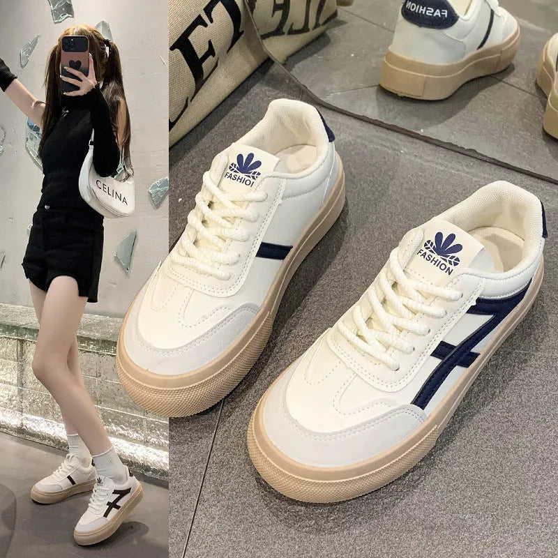 Casual board shoes in brown with low-top design, round toe, and flat rubber sole