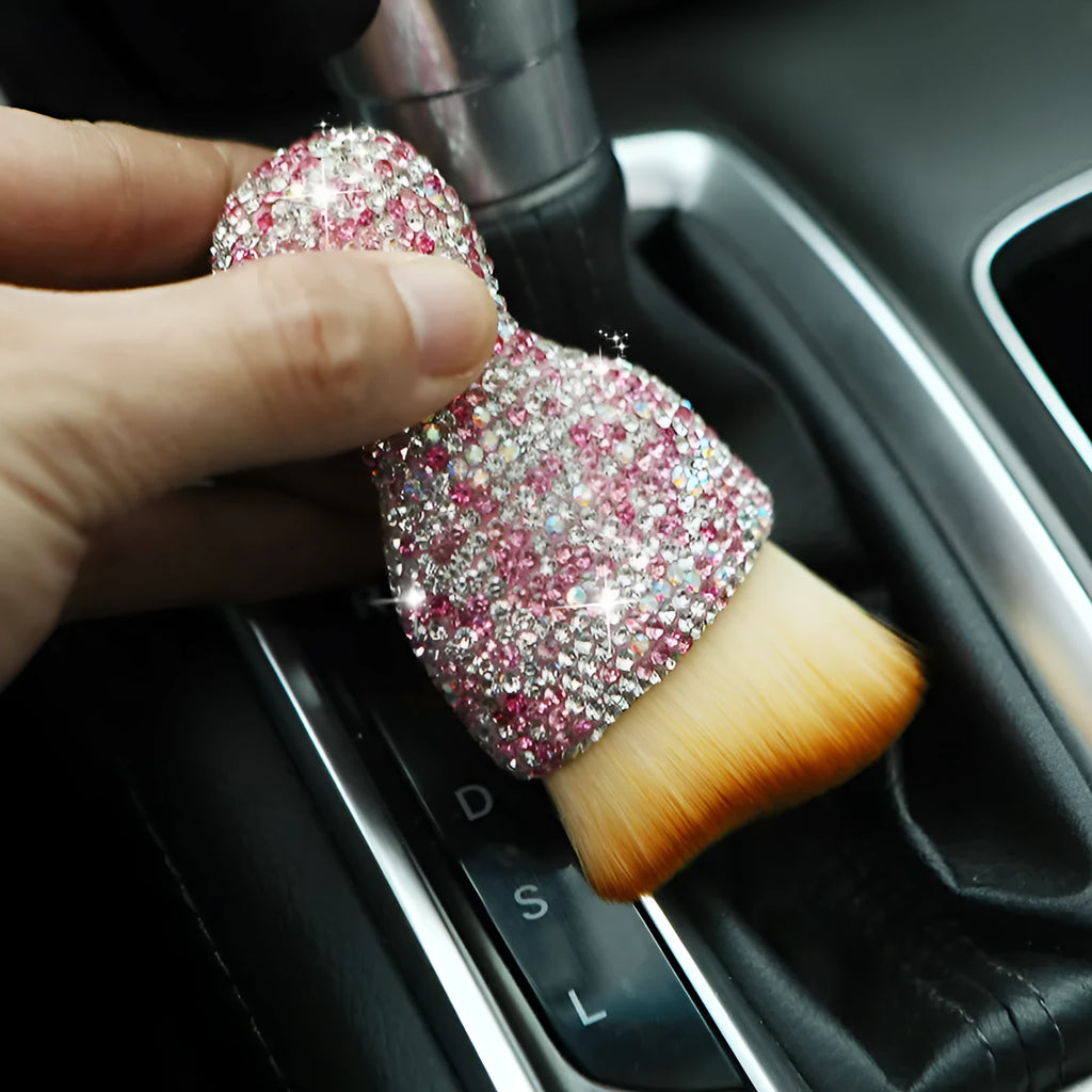 Car interior cleaning brush with soft PVC bristles, shown in white, pink, and black colour options