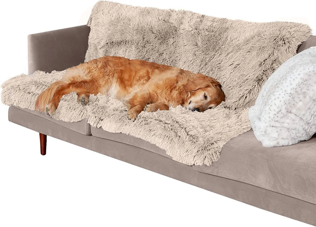 Plush waterproof dog cushion in dark grey, showing soft fabric surface and thick edges.