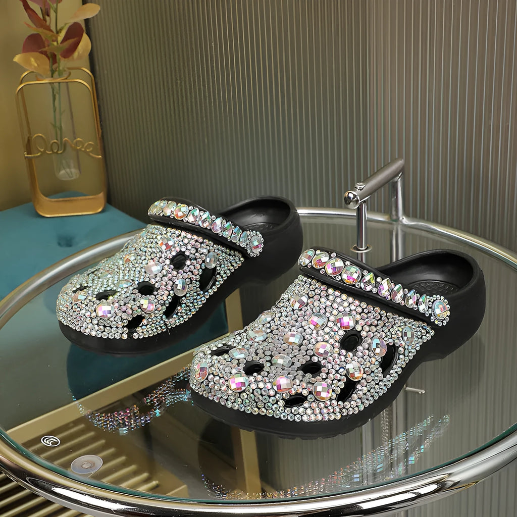 Black women's platform sandals with rhinestone decoration and a thick EVA sole.