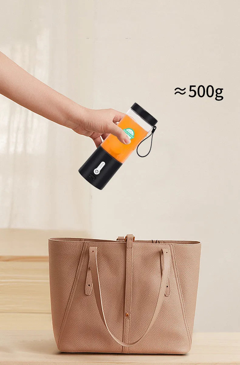 Black rechargeable portable juicer with USB charging port, 530ml capacity, and PC food grade plastic liner