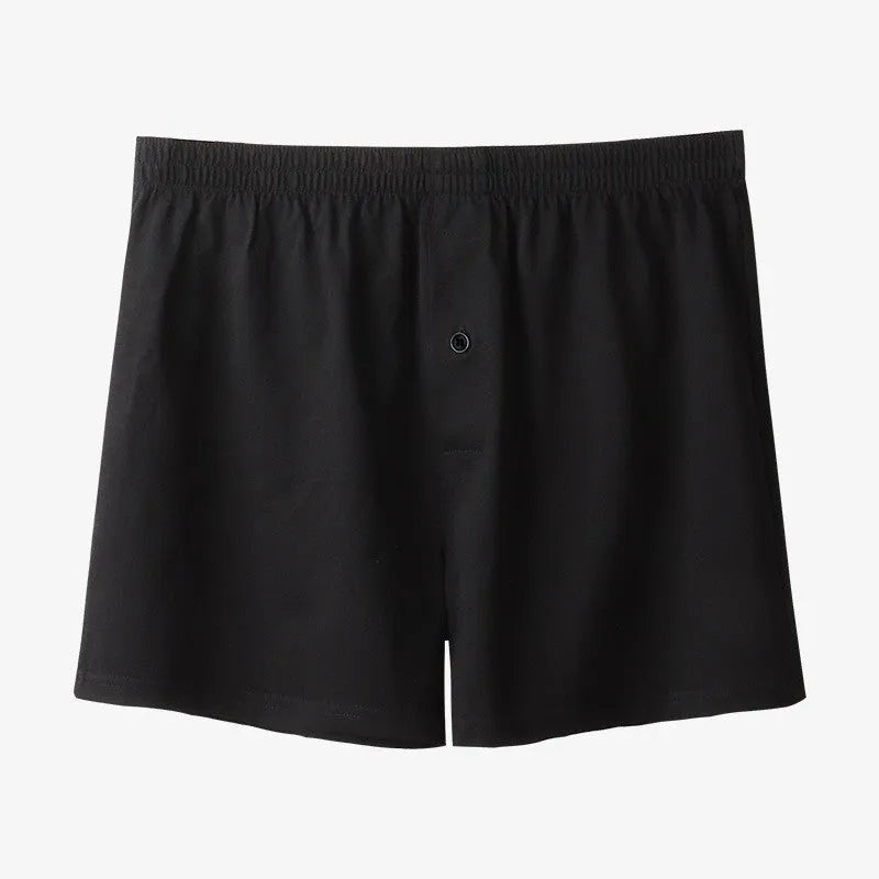 Men's light grey cotton boxer shorts with high waist and loose fit design
