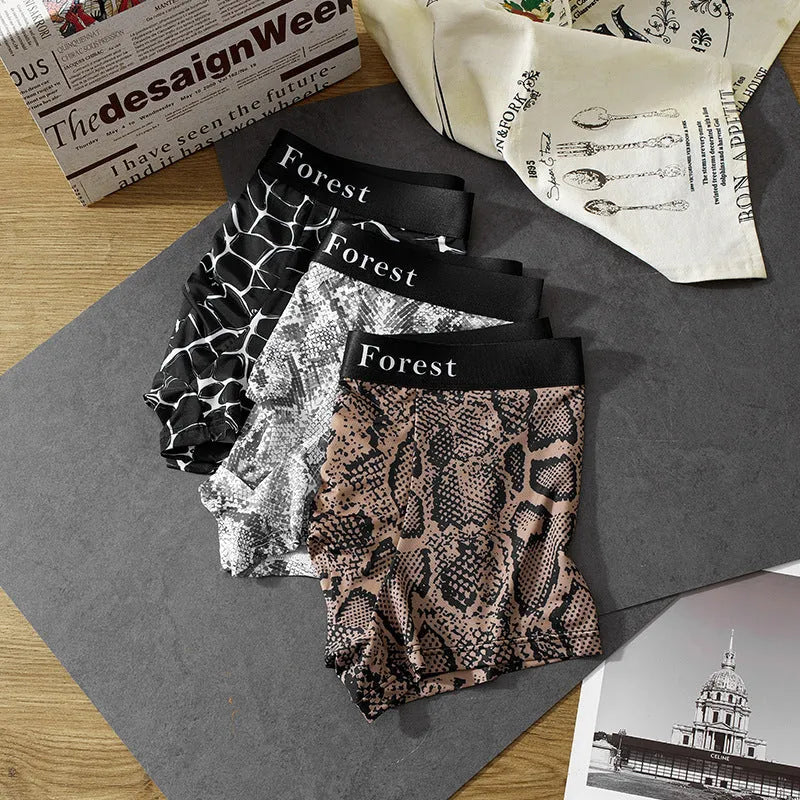 Men's thin loose knit polyester boxer shorts in black, grey, or brown colours on a mid-waist fit
