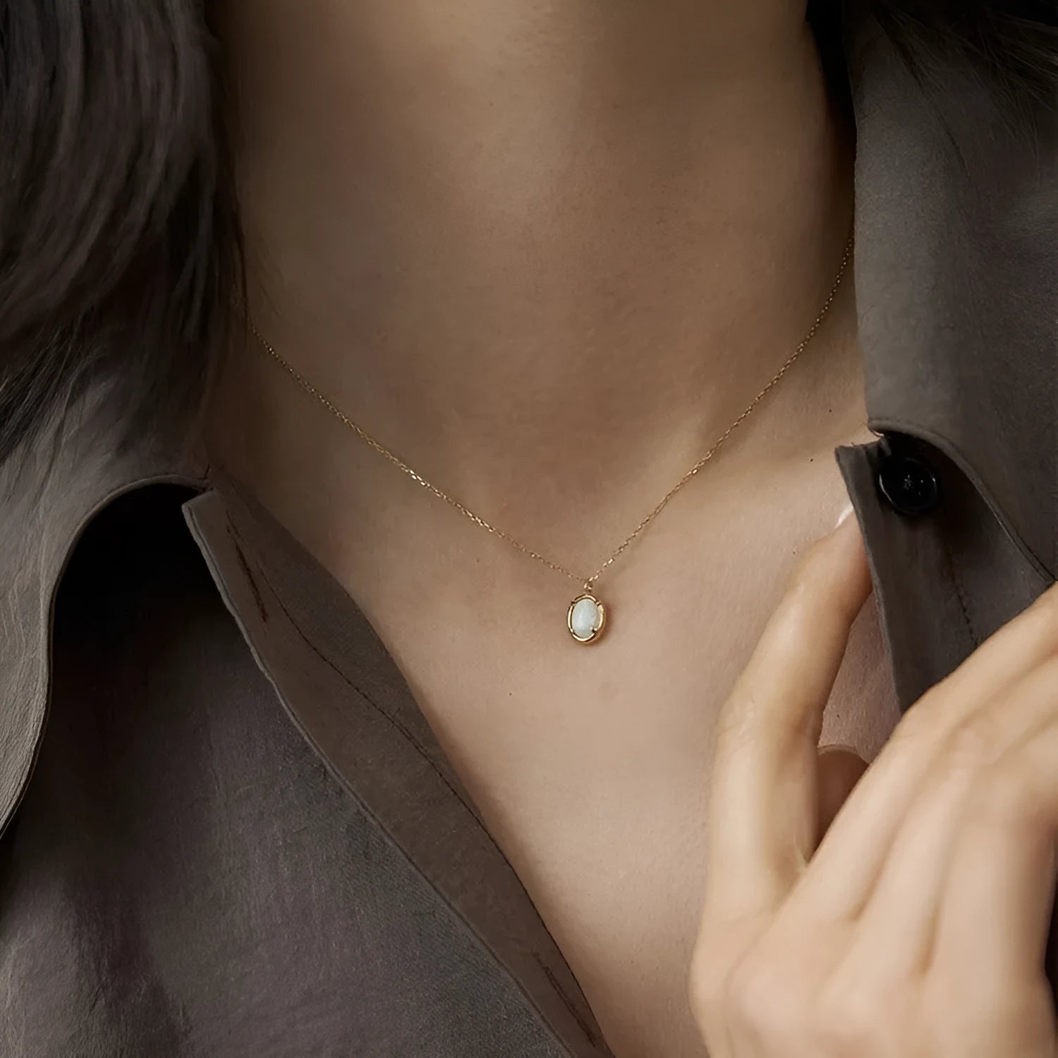 Geometric oval jelly opal pendant necklace in S925 silver with gold or white gold plating.
