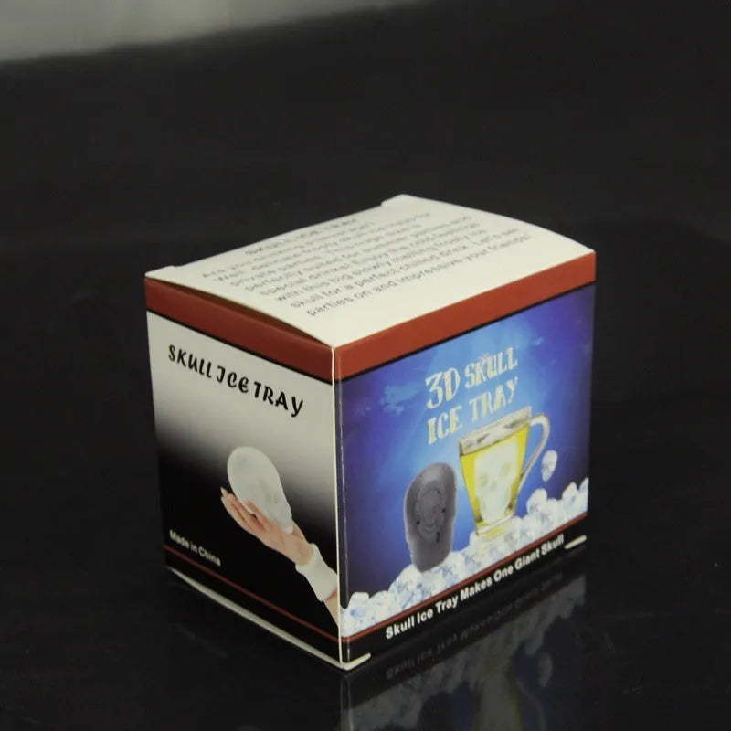 White silicone Halloween ice cube tray with detailed 3D skull mould cavities.