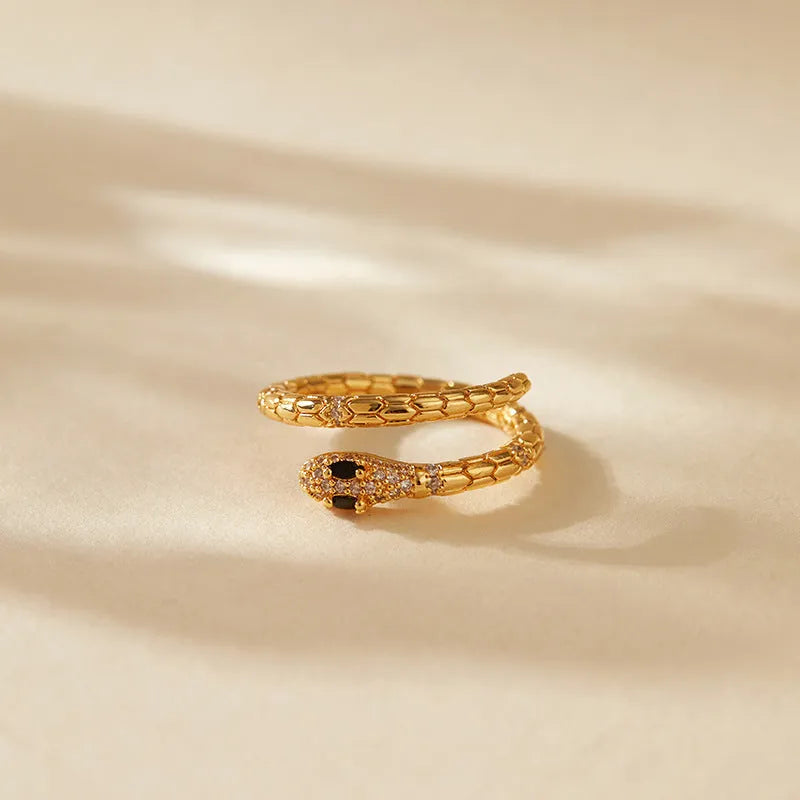 Adjustable copper snake ring with gold colour finish and diamond surface treatment