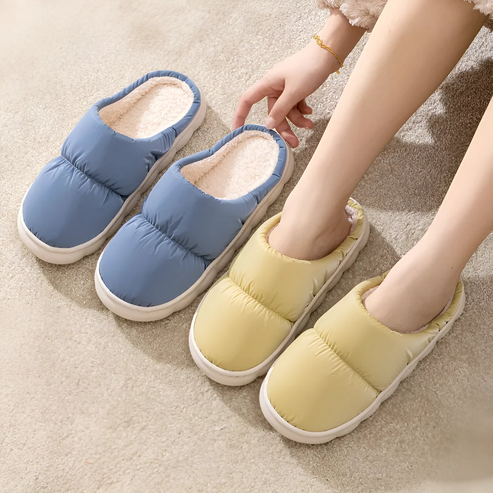Down cotton winter slippers with artificial leather upper, thick rubber sole, and plush lining in blue colour
