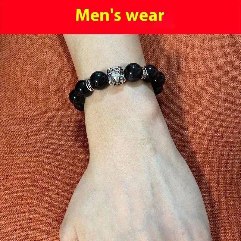 Obsidian bracelet with silver 999 detail and lucky colour eye beads in 10mm and 12mm sizes.