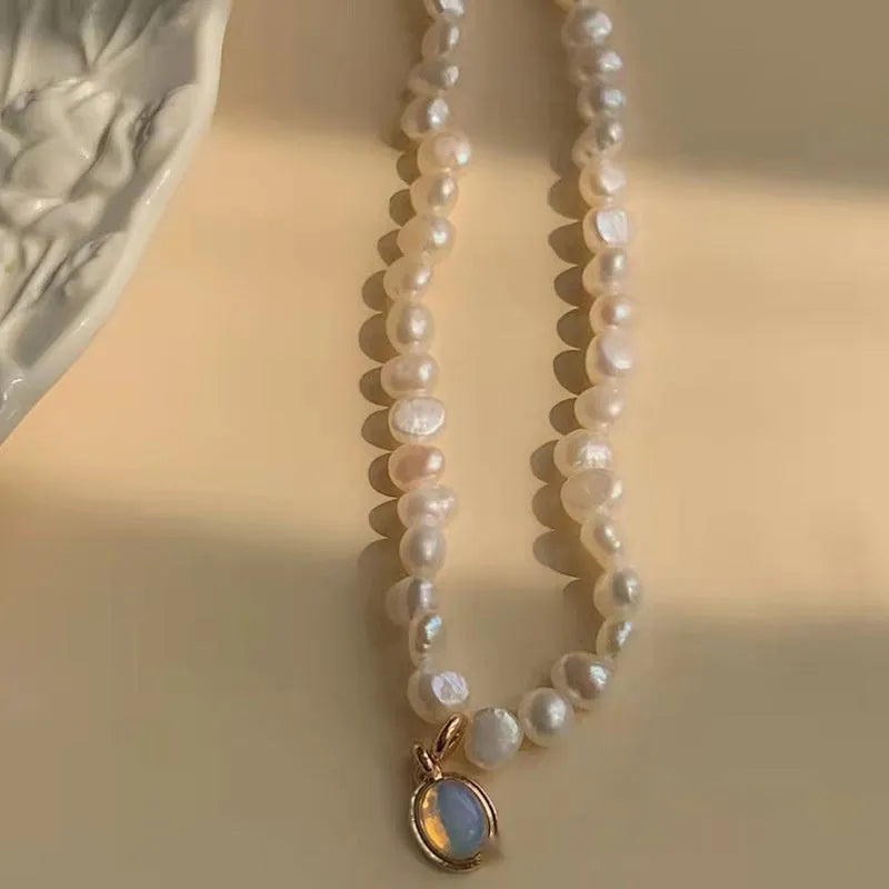 French Court style vintage pearl necklace with geometric shapes on an adjustable metal chain.