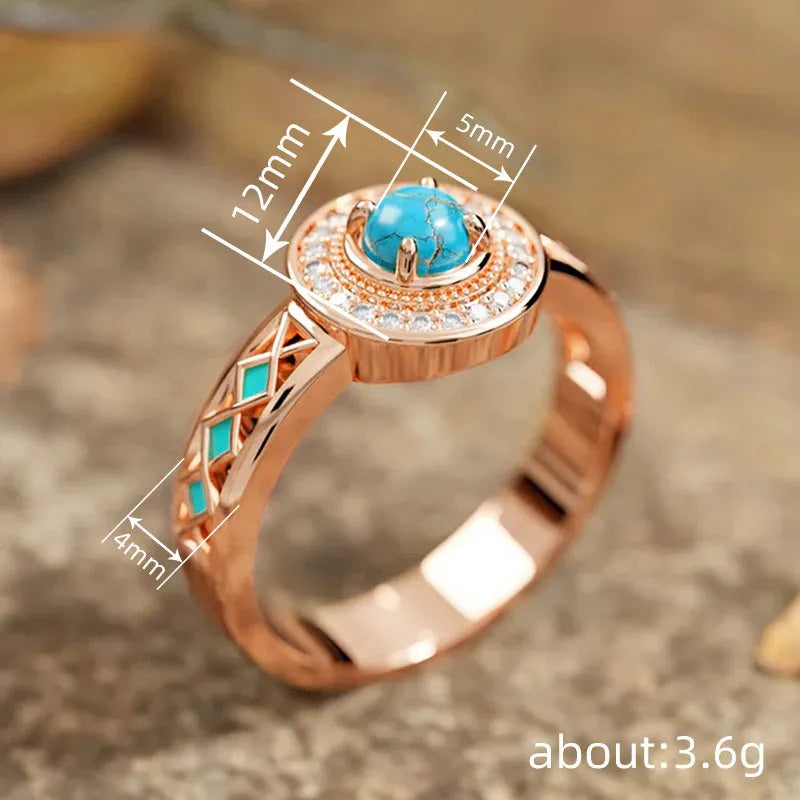 Women's rose gold copper ring with geometric design and inlaid turquoise-style zircon stones.