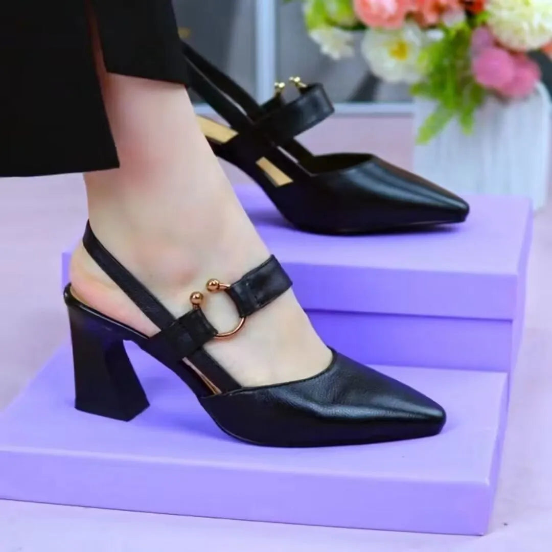 Women's apricot coloured leather sandals with a closed toe, chunky high heel, and rubber sole.