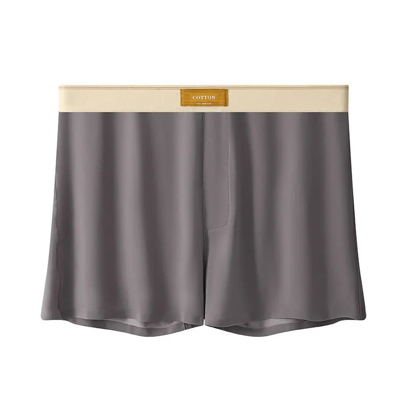Men's solid colour loose Ice Silk underwear briefs on a neutral background