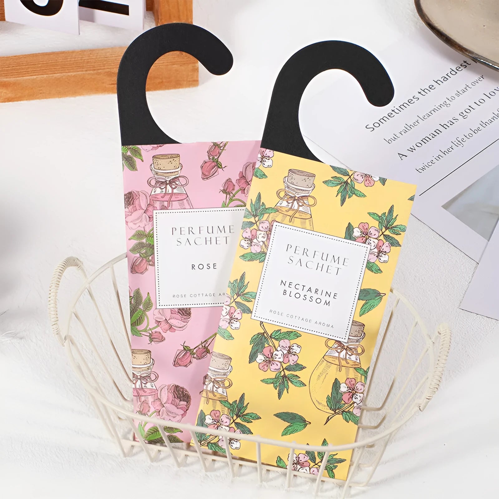 Five 30g lavender and rose scented wardrobe sachets on a shelf, each measuring 21x8cm