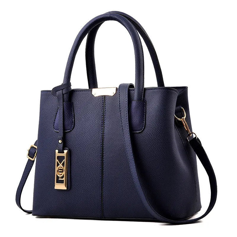 Soft PU fashion handbag with leather shoulder strap in horizontal square shape