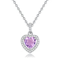 Sterling silver heart pendant necklace with a natural coloured gemstone on an adjustable cross chain.