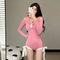 Women's long-sleeve one-piece swimsuit in polyester fabric available pink or black colours