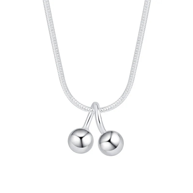 Women's silver cherry necklace with adjustable snake bone chain and fruit pendant
