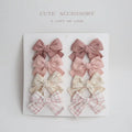 Children's cloth hairclips with dovetail bow decoration in multiple colour options