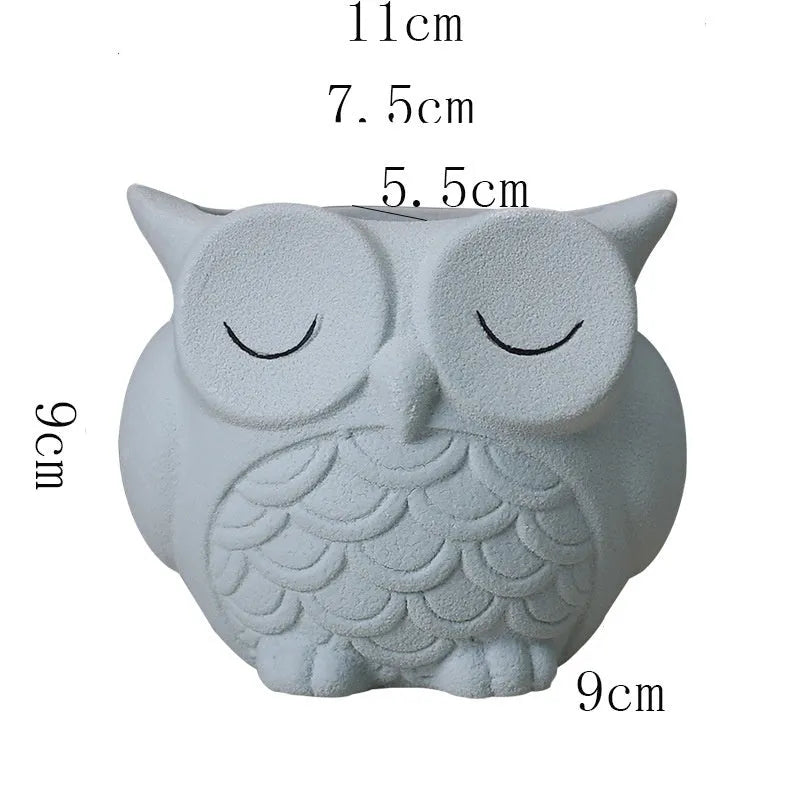 Handmade ceramic owl succulent pot in light pink with 11x9x9cm dimensions