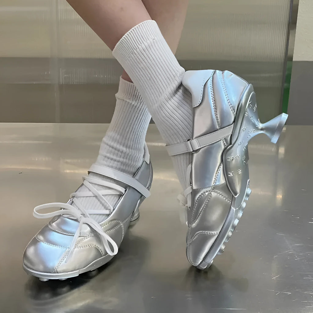 Women's silver creative lace-up bow sports shoes with mid heel and round toe on a white background.