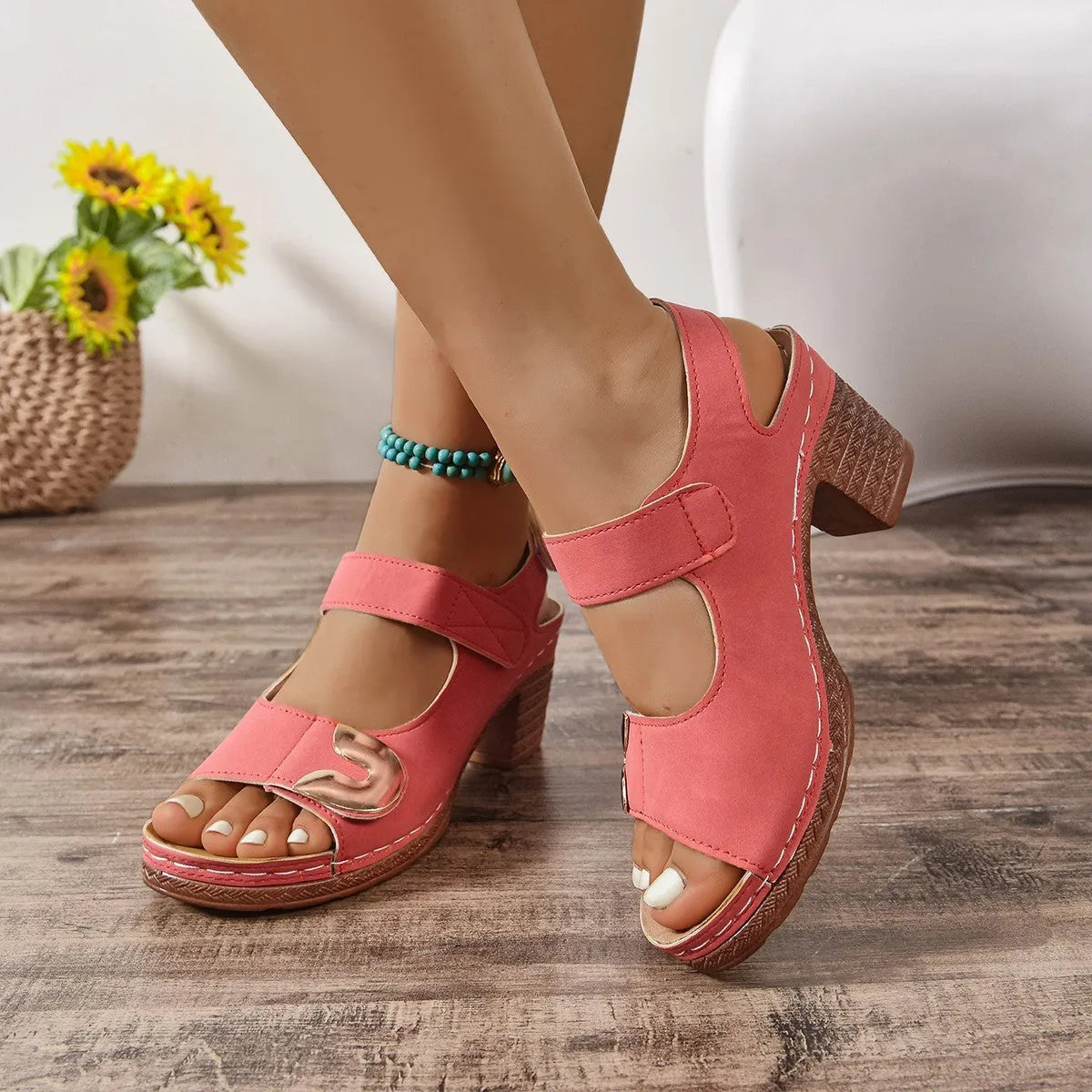 Women's light brown Velcro-strap Roman sandals with a round toe and rubber sole.