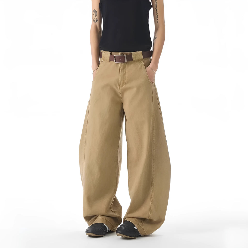 Brown loose fit straight leg men's jeans with a button fly on a mid waist.