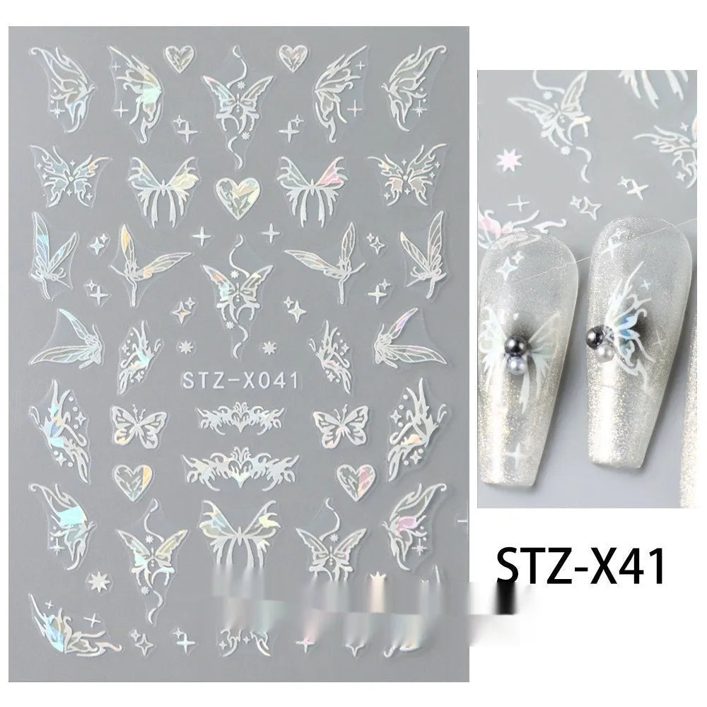 Sheet of black and silver strip nail art stickers with cartoon and love heart designs